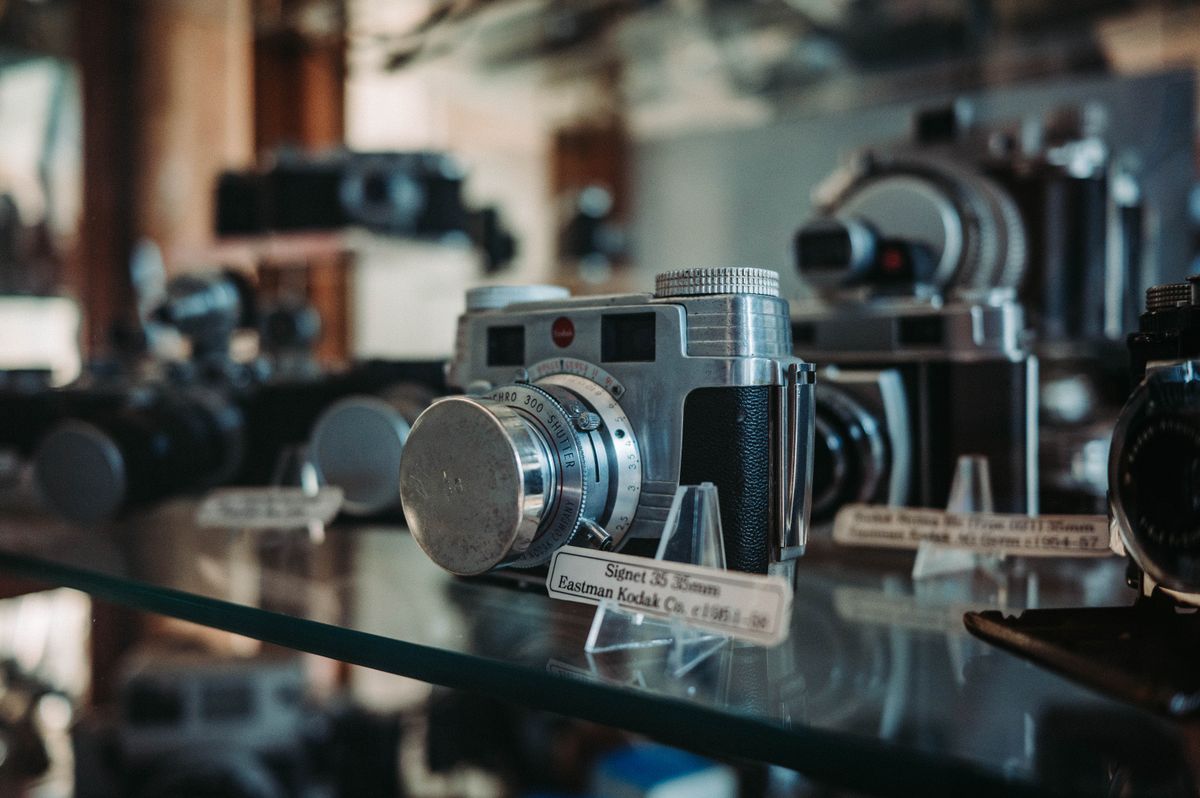 A display of vintage cameras — among the most common optical instruments in everyday use