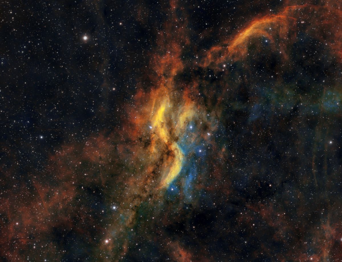Glowing cosmic gas and stars, like the hot plasma fog of the early universe