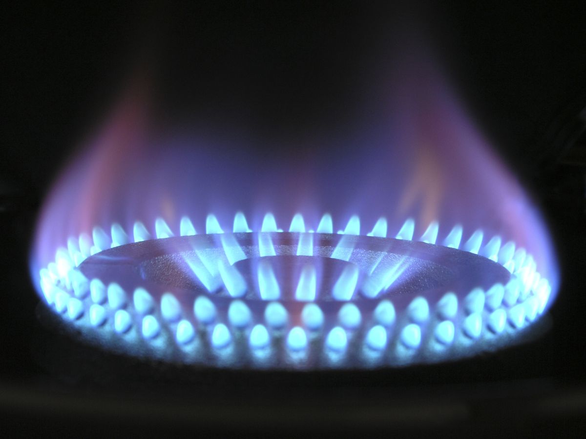 A blue gas flame, showing why a lighter flame changes colour