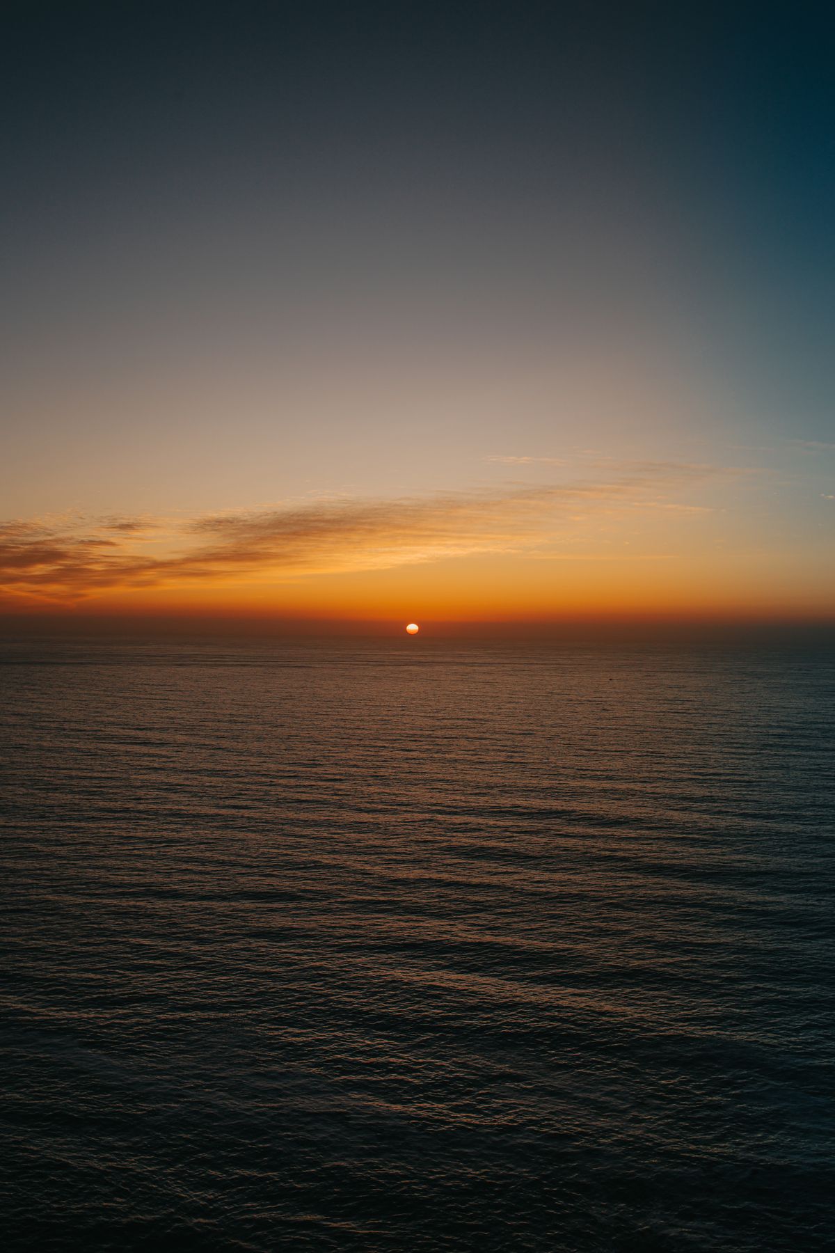 superior mirage optical illusion over the ocean horizon with atmospheric refraction