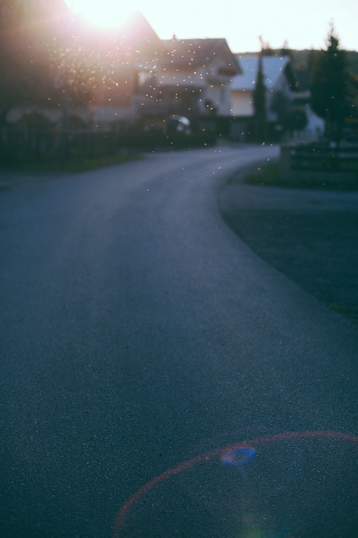 inferior mirage on a hot road appearing like water on the asphalt surface