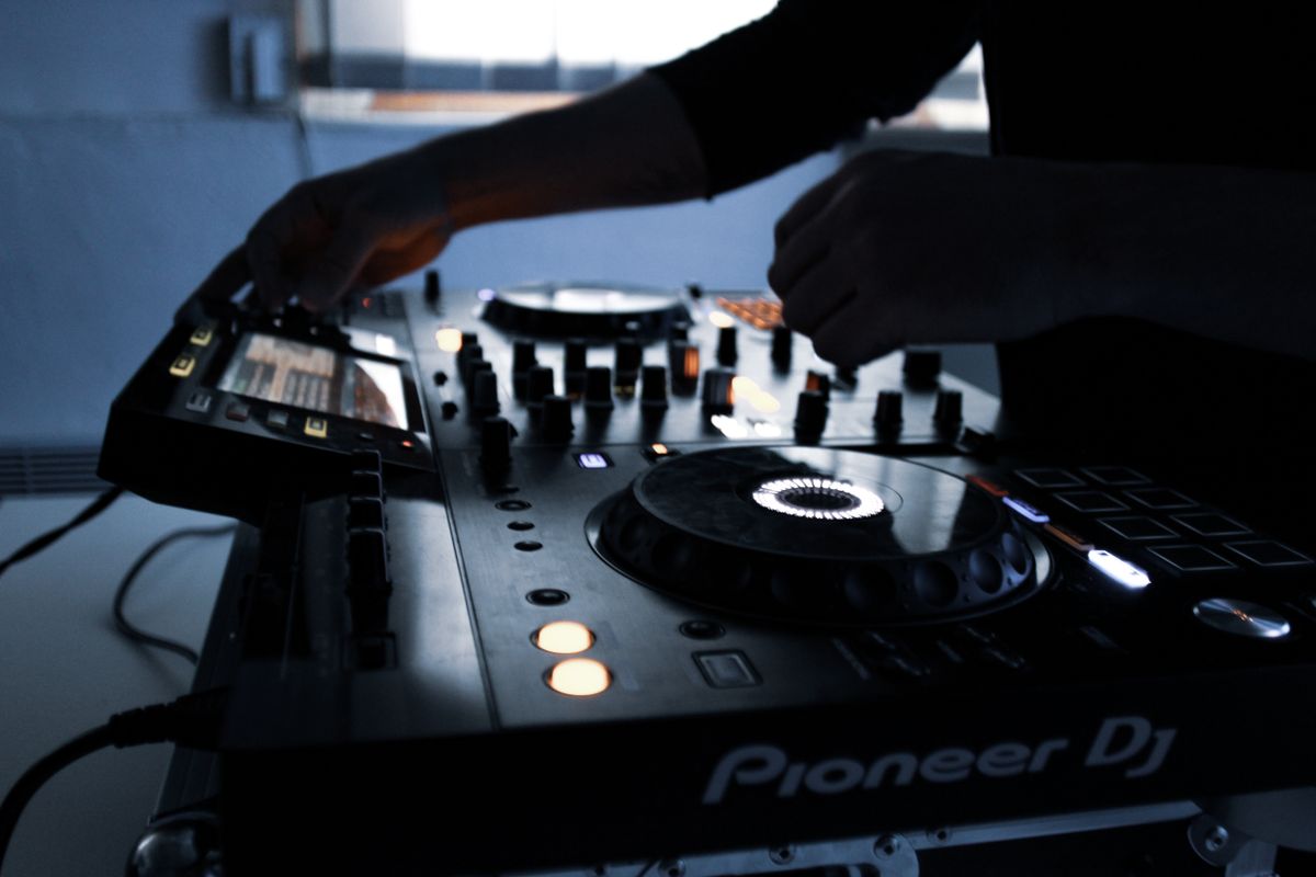 Audio mixing console and studio speakers used in professional sound engineering