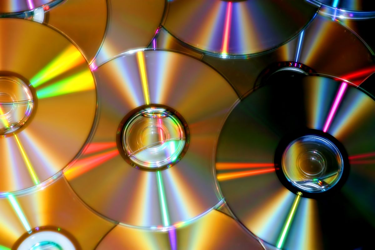 Compact discs reflecting rainbow colours, a diffraction grating in action